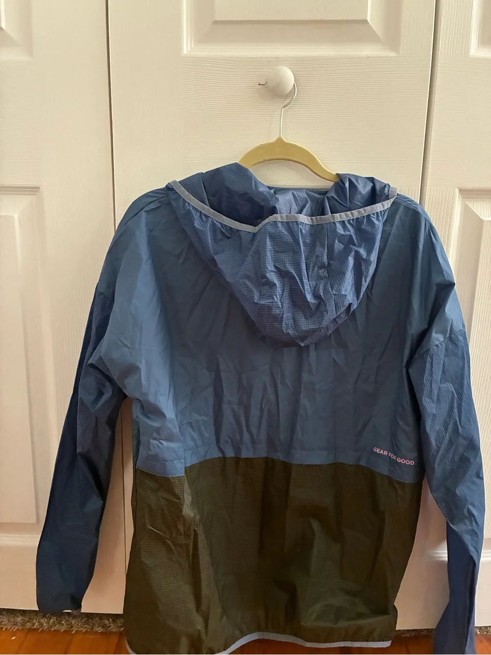 cotopaxi Navy Jacket with Yellow Zipper and Pink Logo